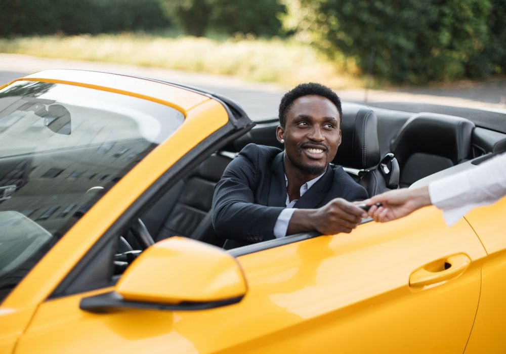 African businessman in a Car Rental Service